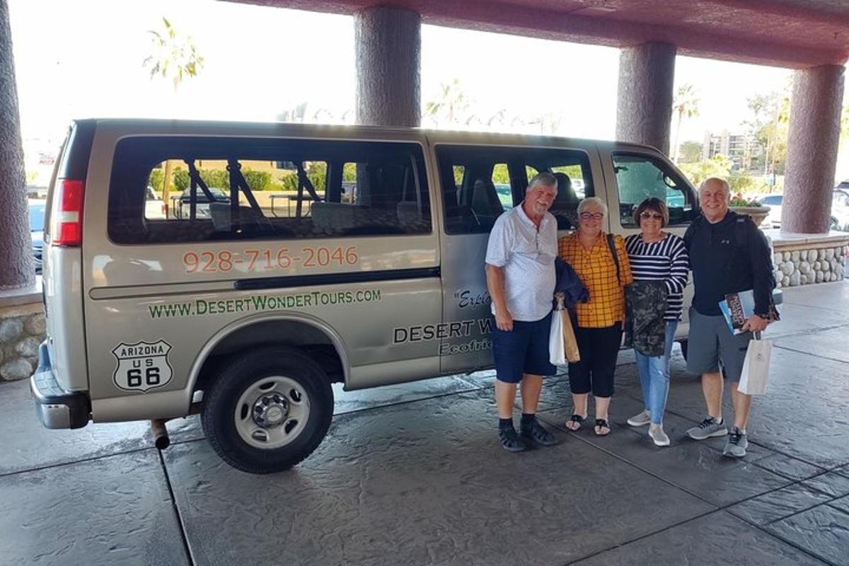 a group of people standing in front of a van