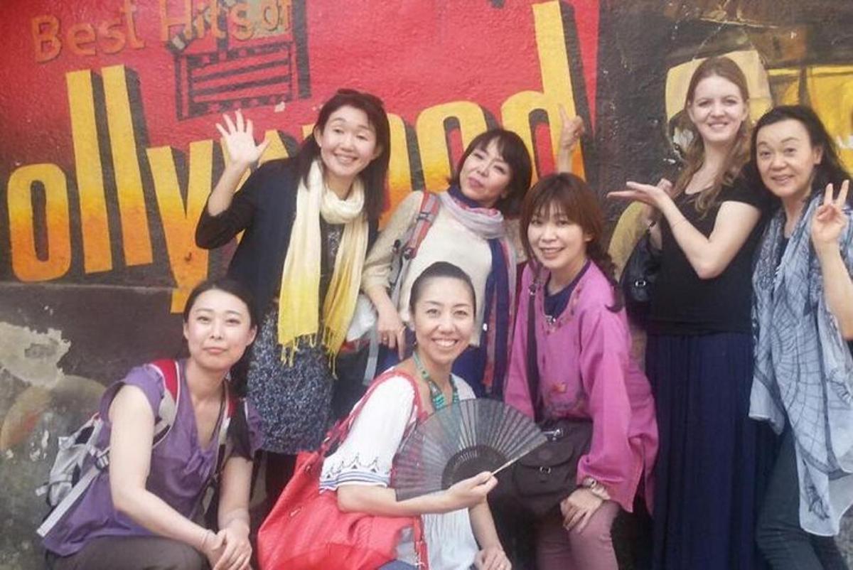 a group of women are posing for a picture