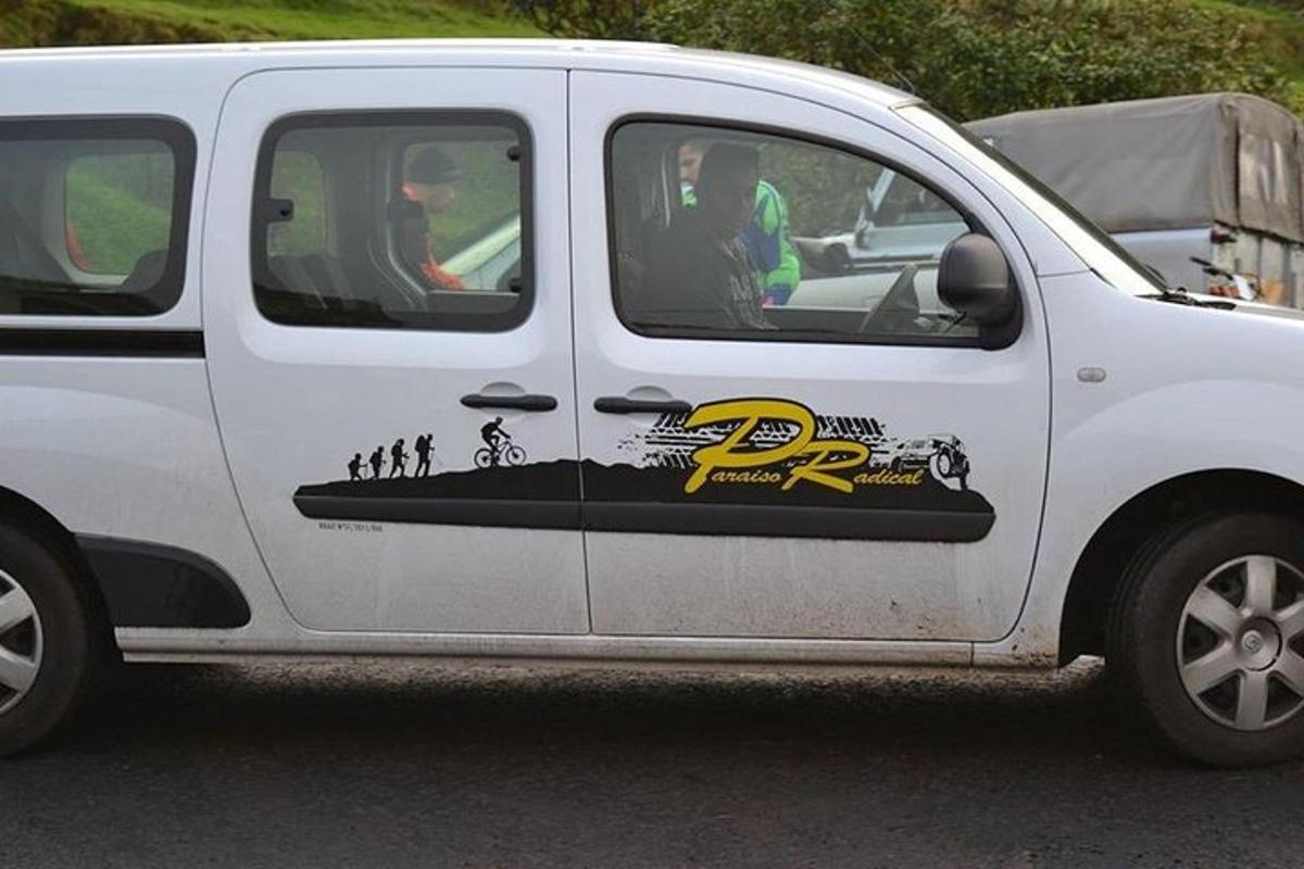 a white van with a logo on the side of it