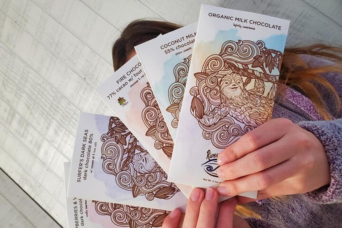a woman holding three cards in her hands