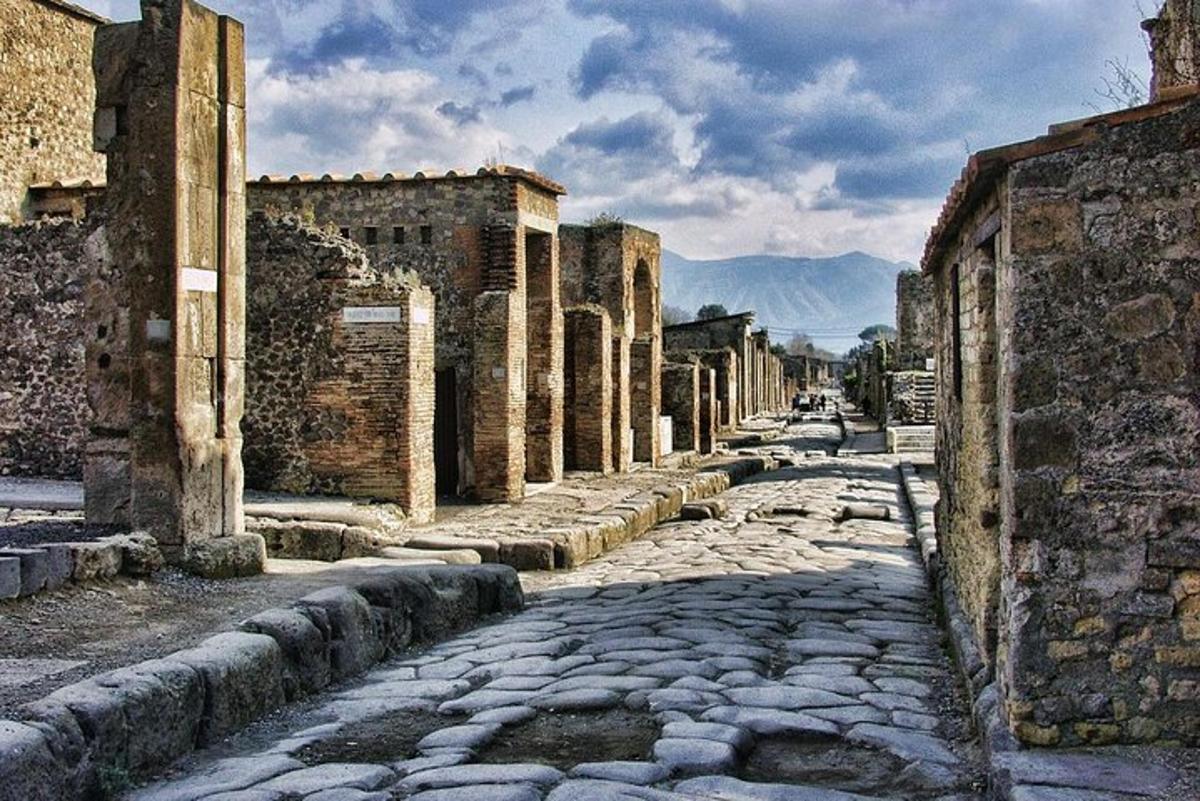 an empty street in an old city with buildings
