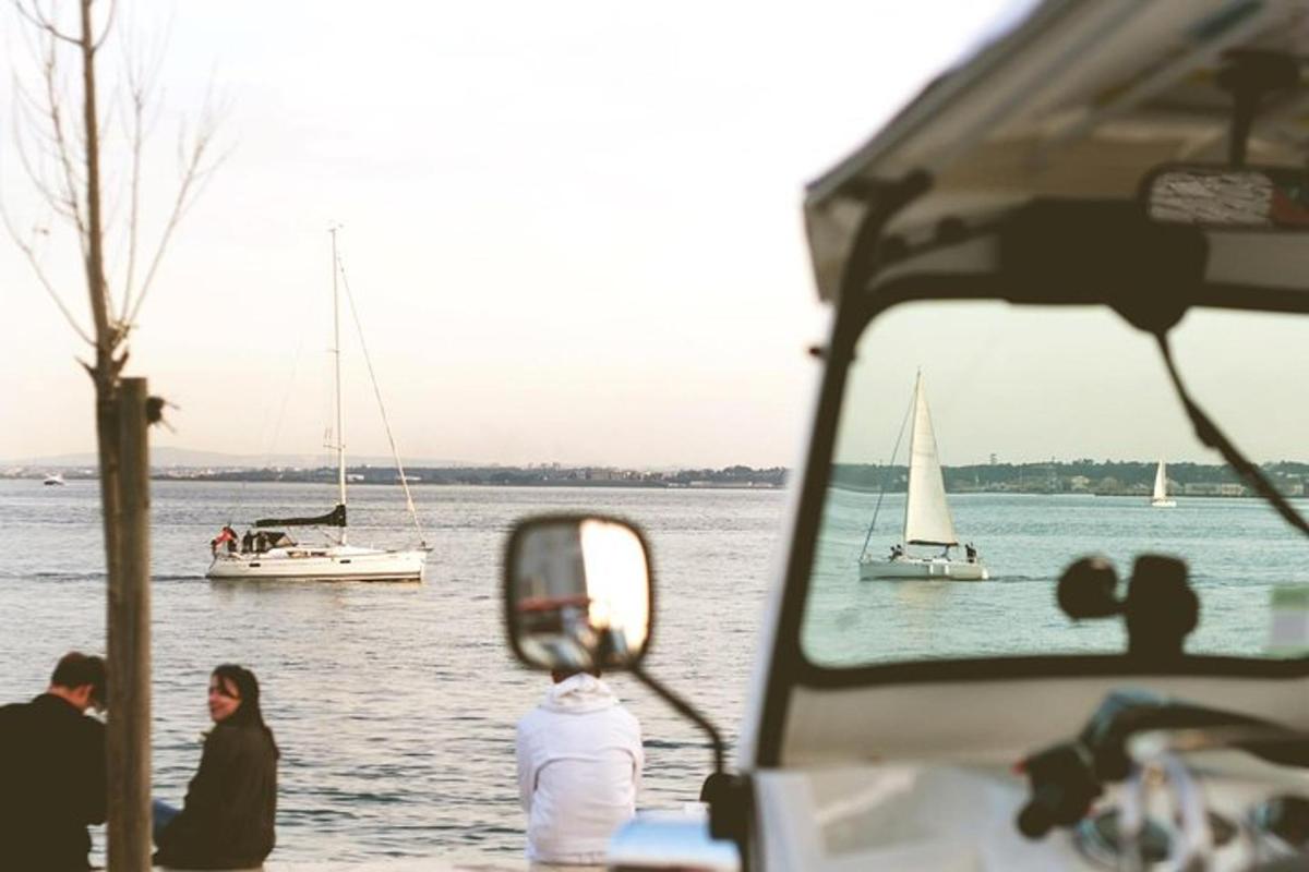 a group of people looking at boats in the water