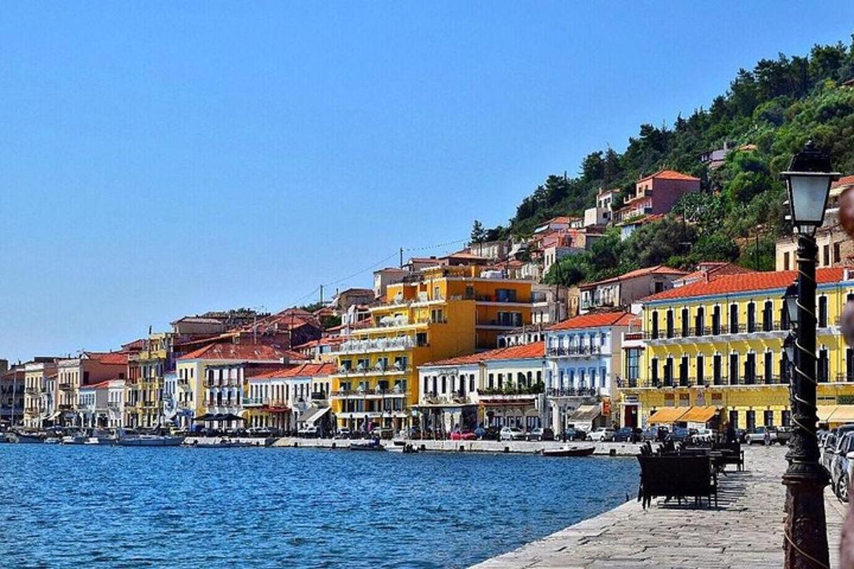 a group of buildings next to a body of water