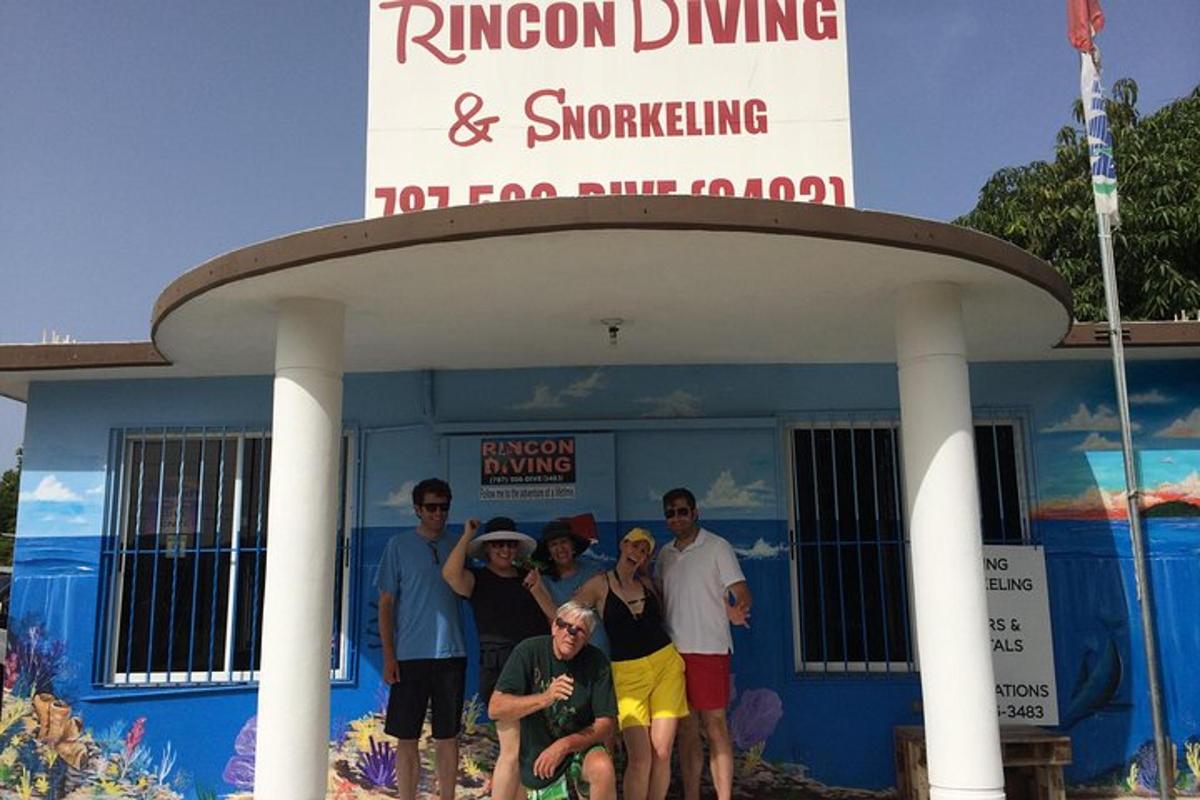 a group of people standing in front of a building