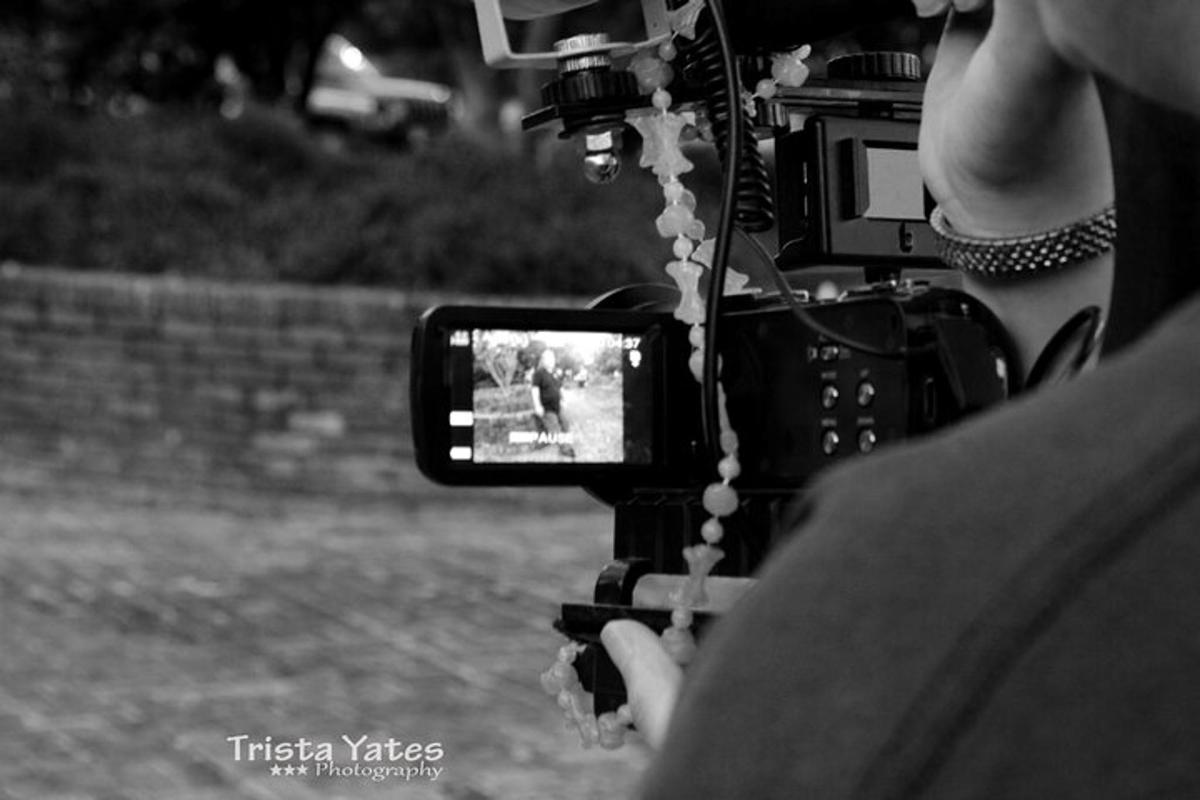 a person taking a picture with a camera