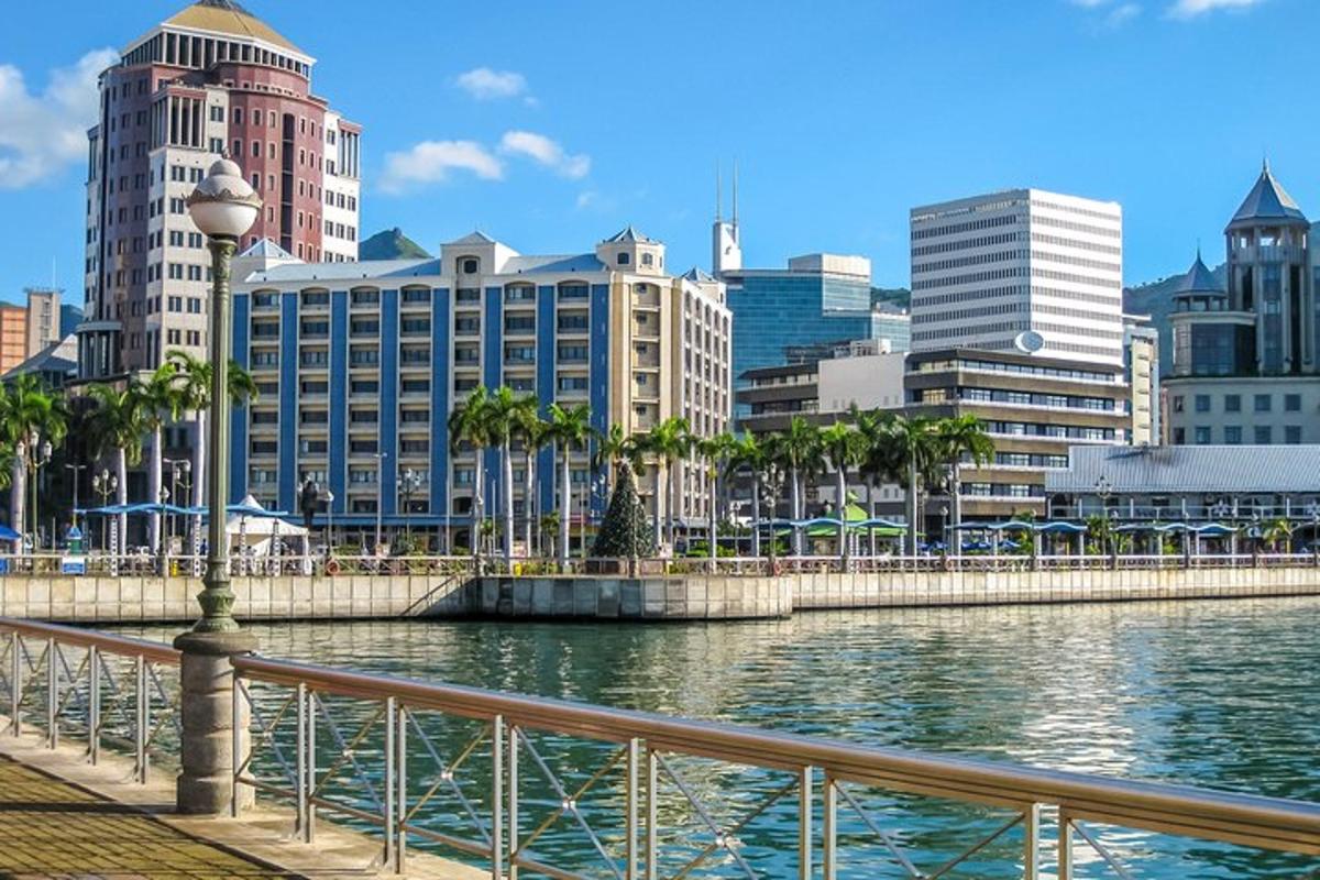 a city with tall buildings and a body of water