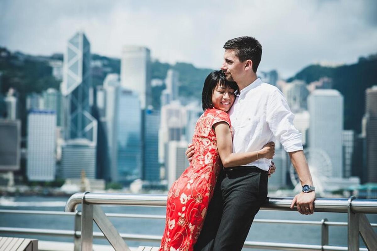 a man and a woman sitting on a railing