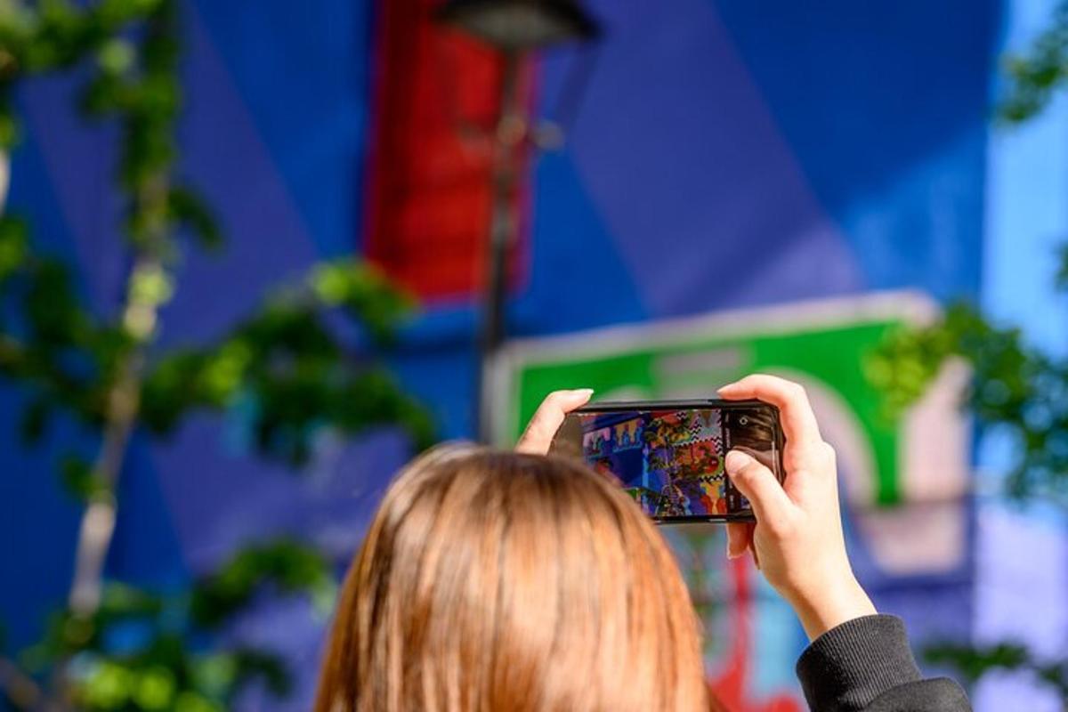 a woman taking a picture with her cell phone