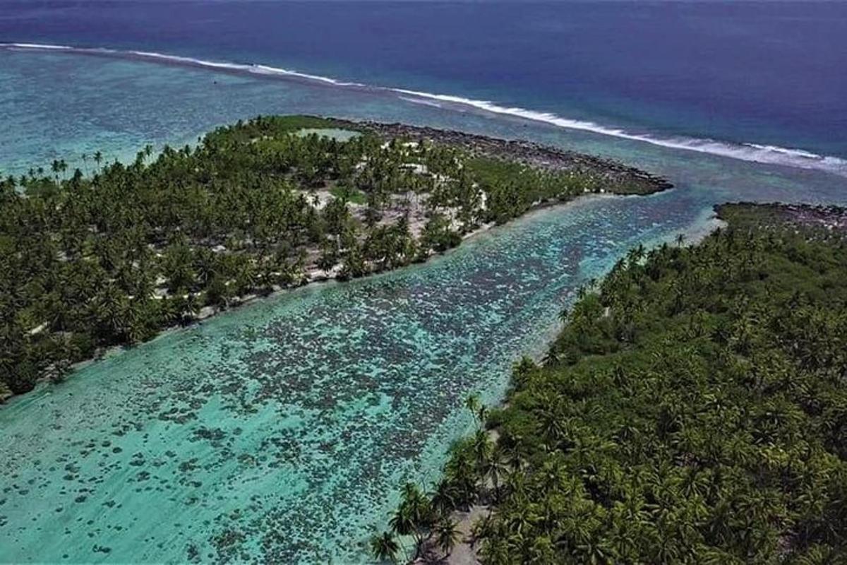 an aerial view of an island in the ocean
