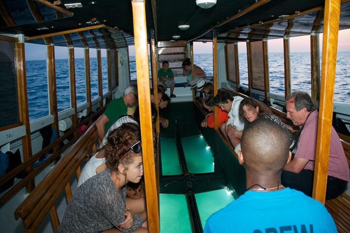 a group of people sitting on a boat