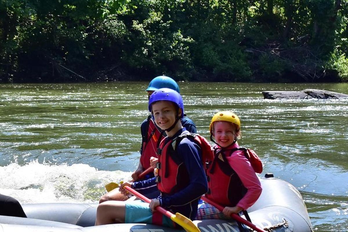 two people on a raft on a river