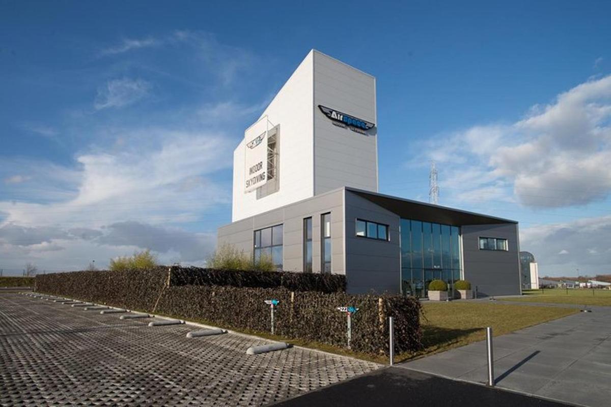 a white building with a sign on the side of it