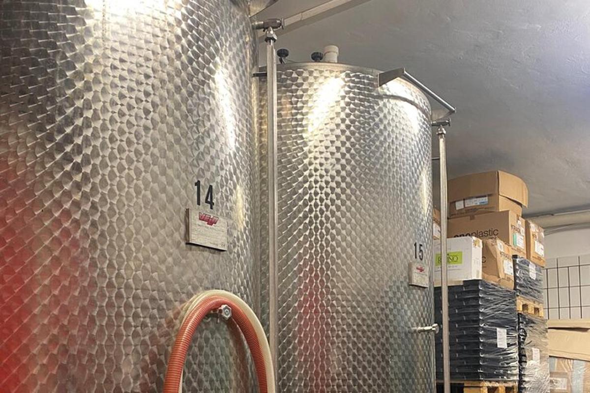 a large metal wall in a room with boxes