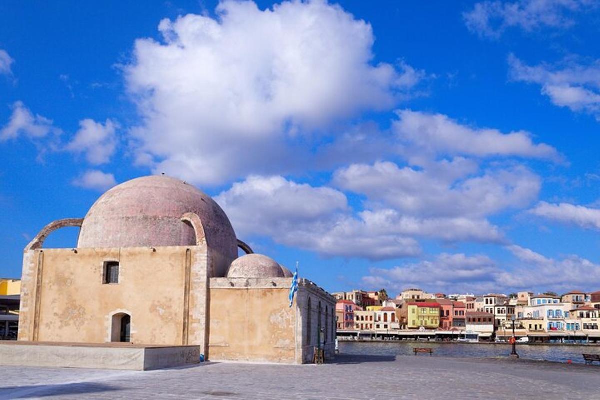 a building with a dome in front of a city
