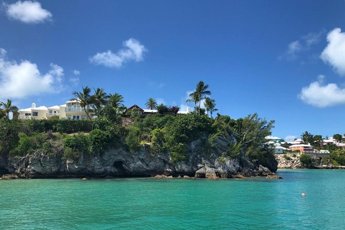 a house on top of an island in the water