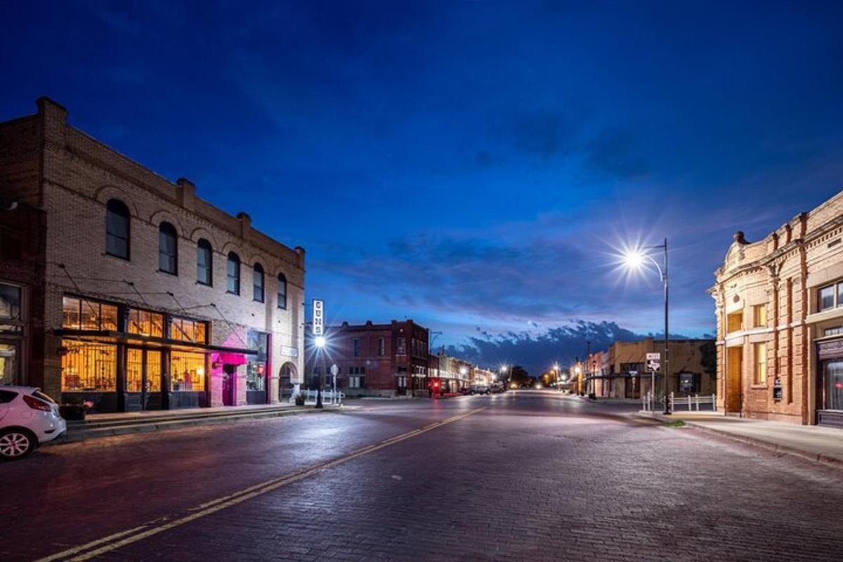 an empty street in a city at night