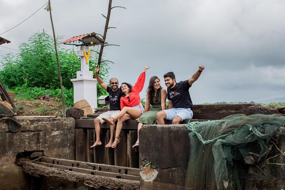 a group of people sitting on a wall