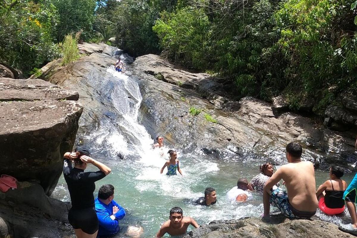 a group of people swimming in a river