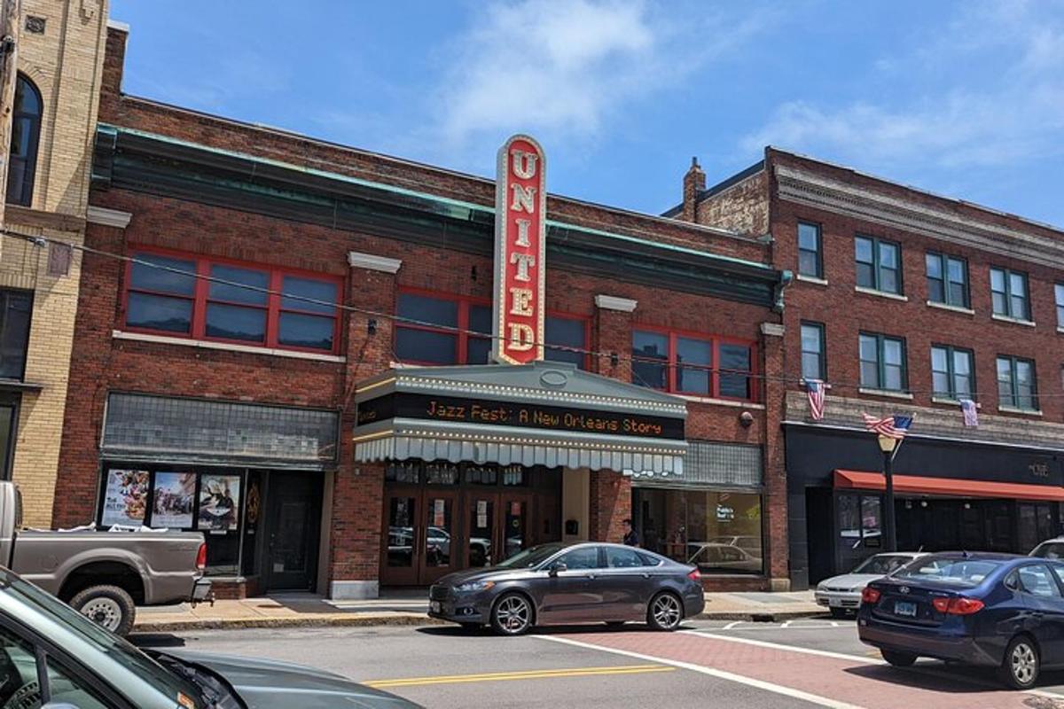 an old brick building with a large sign on it