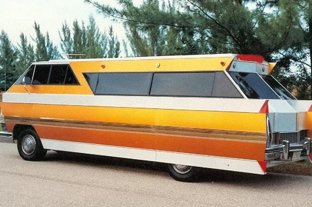 a yellow and orange van parked on the side of the road
