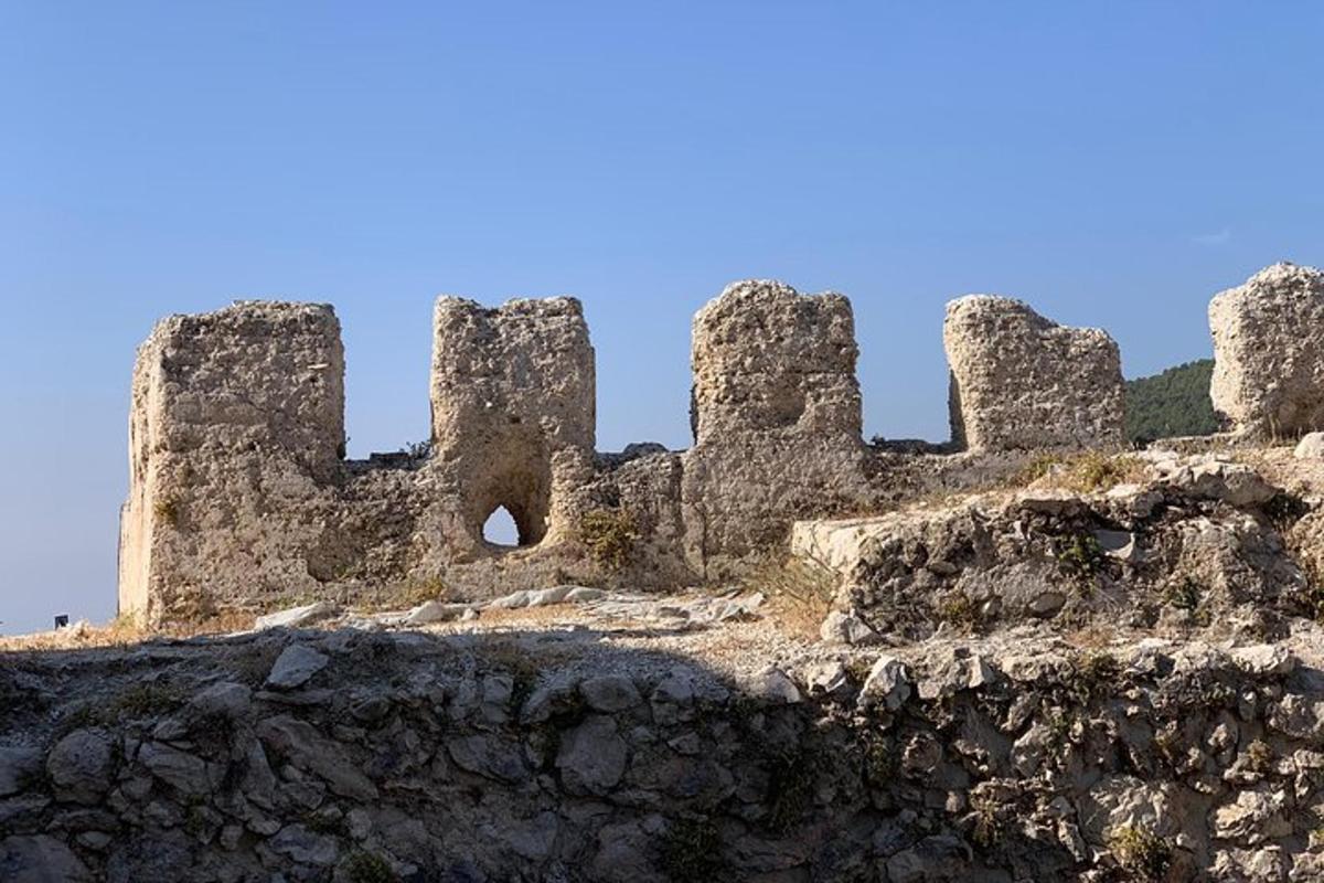 an old castle on top of a mountain