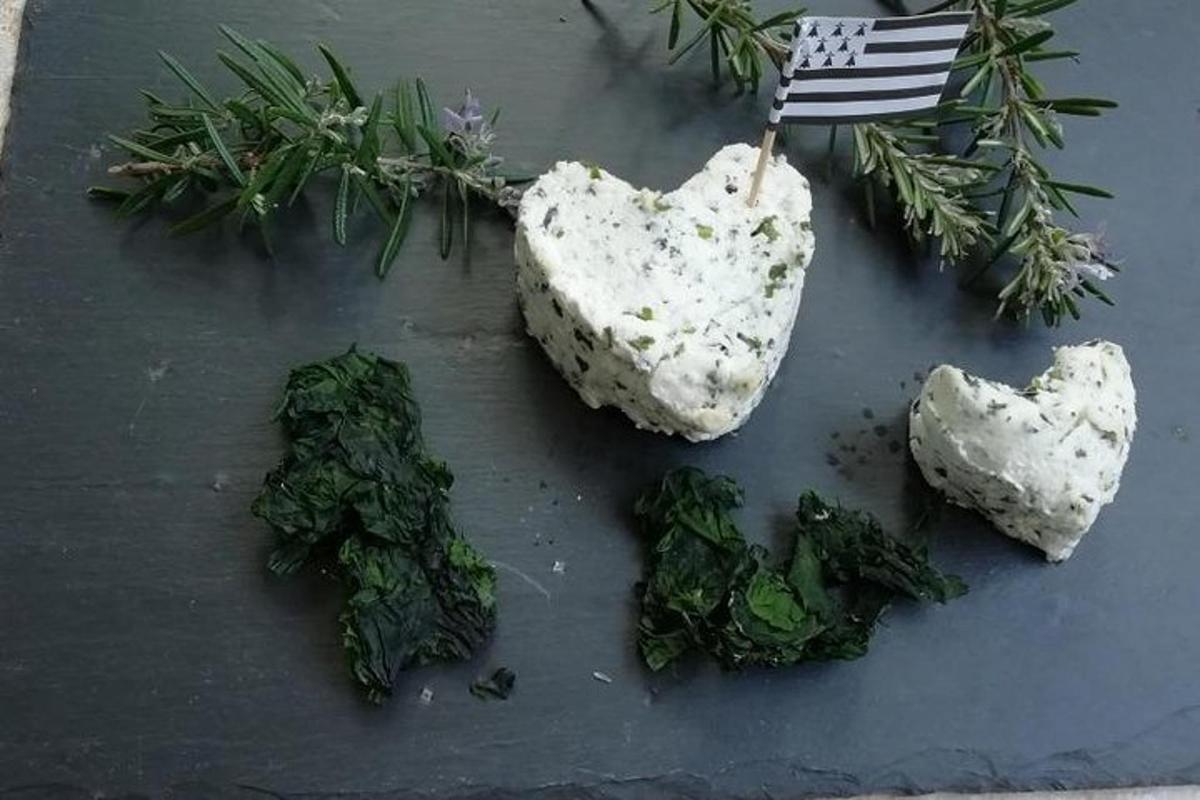 a group of rocks and greens on a table with a flag