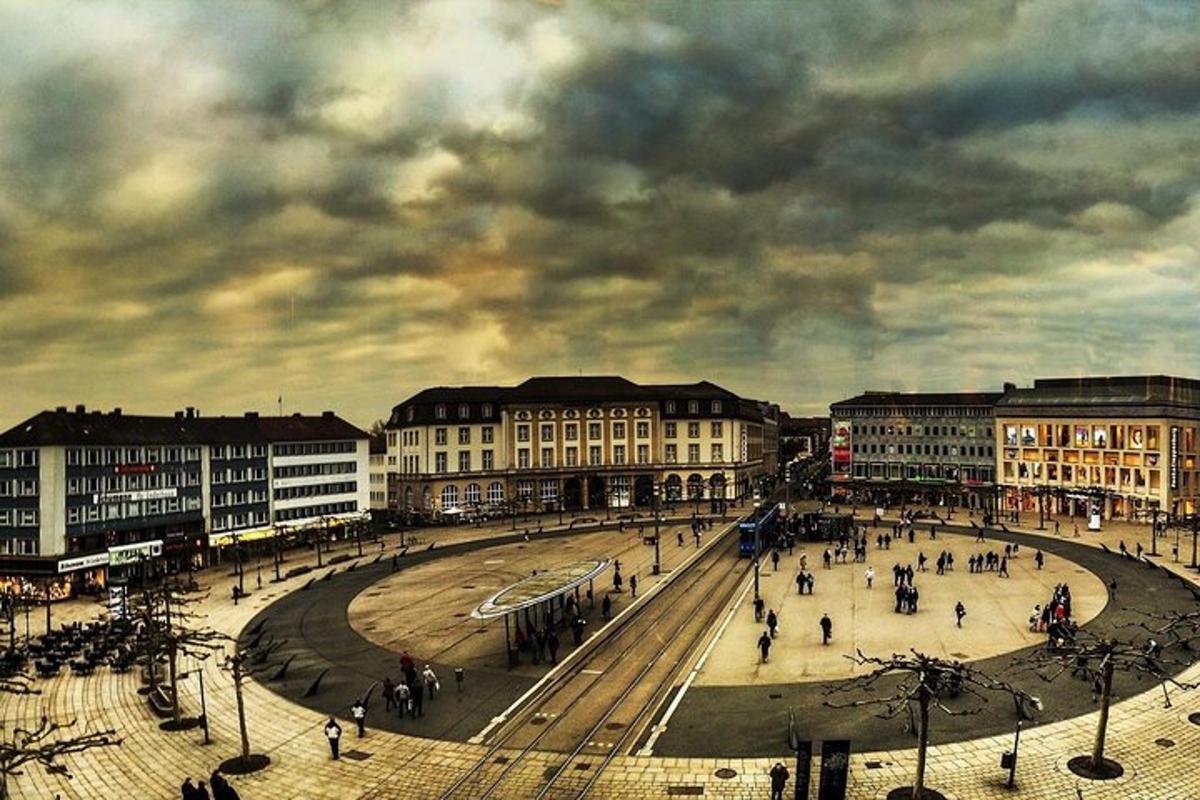 a city with people walking around a street with buildings