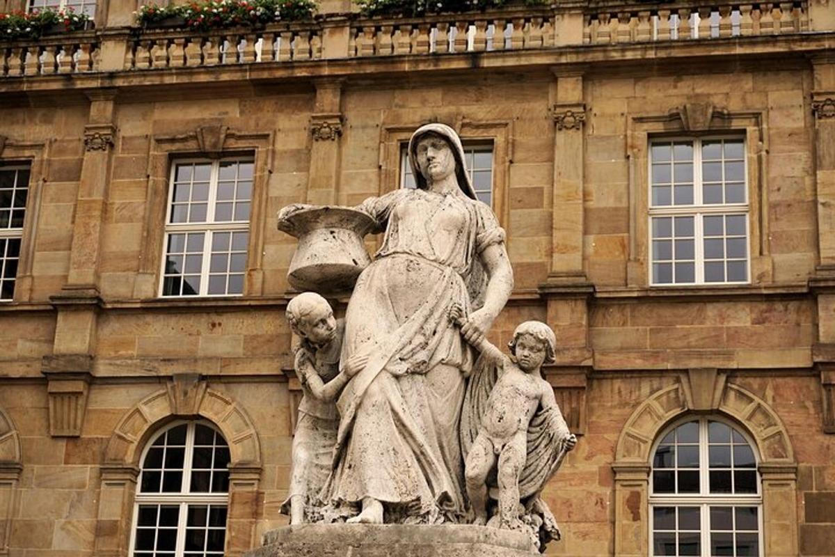 a statue of a woman in front of a building