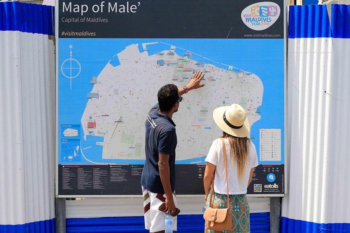 a man and a woman looking at a map
