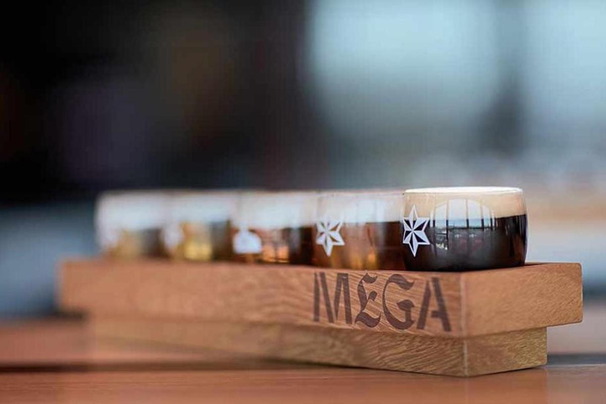 a wooden box with a cup on top of it