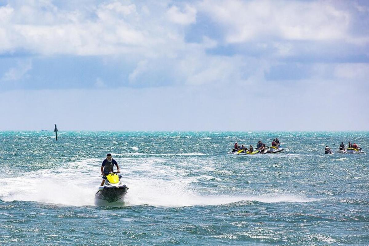 a group of people on boats in the water