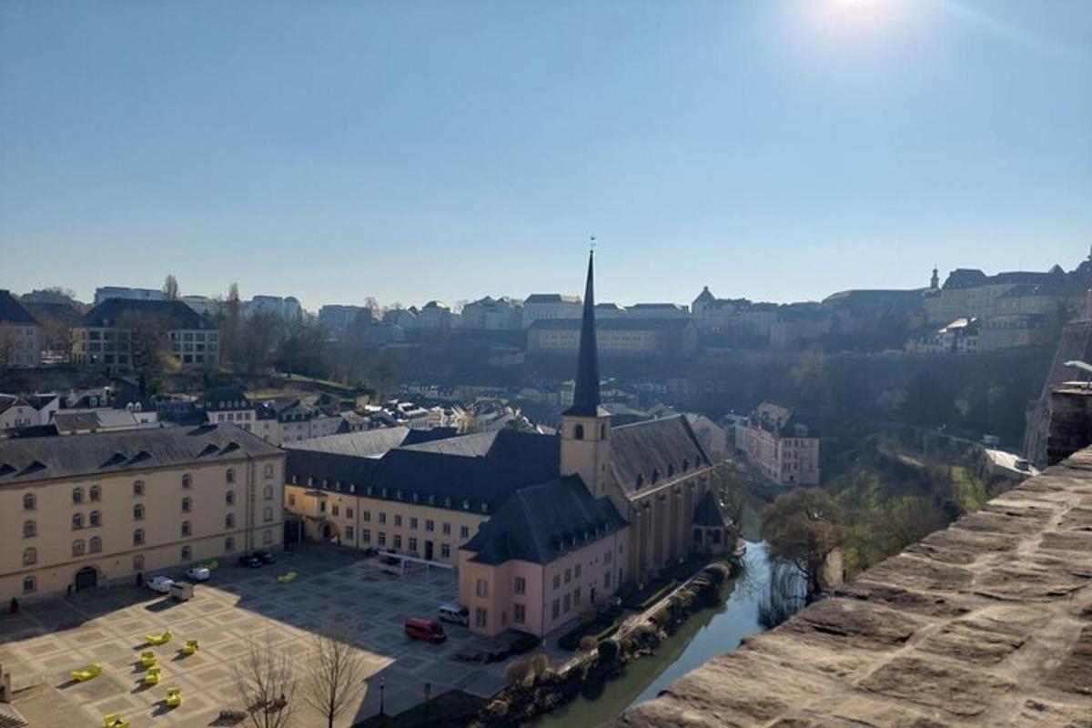 a view of a city with a church and a river