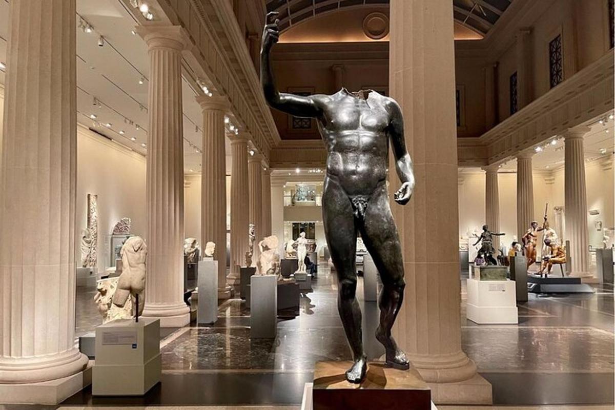 a statue of a man in a museum