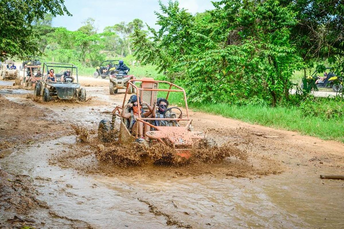 a group of people riding on a dirt road