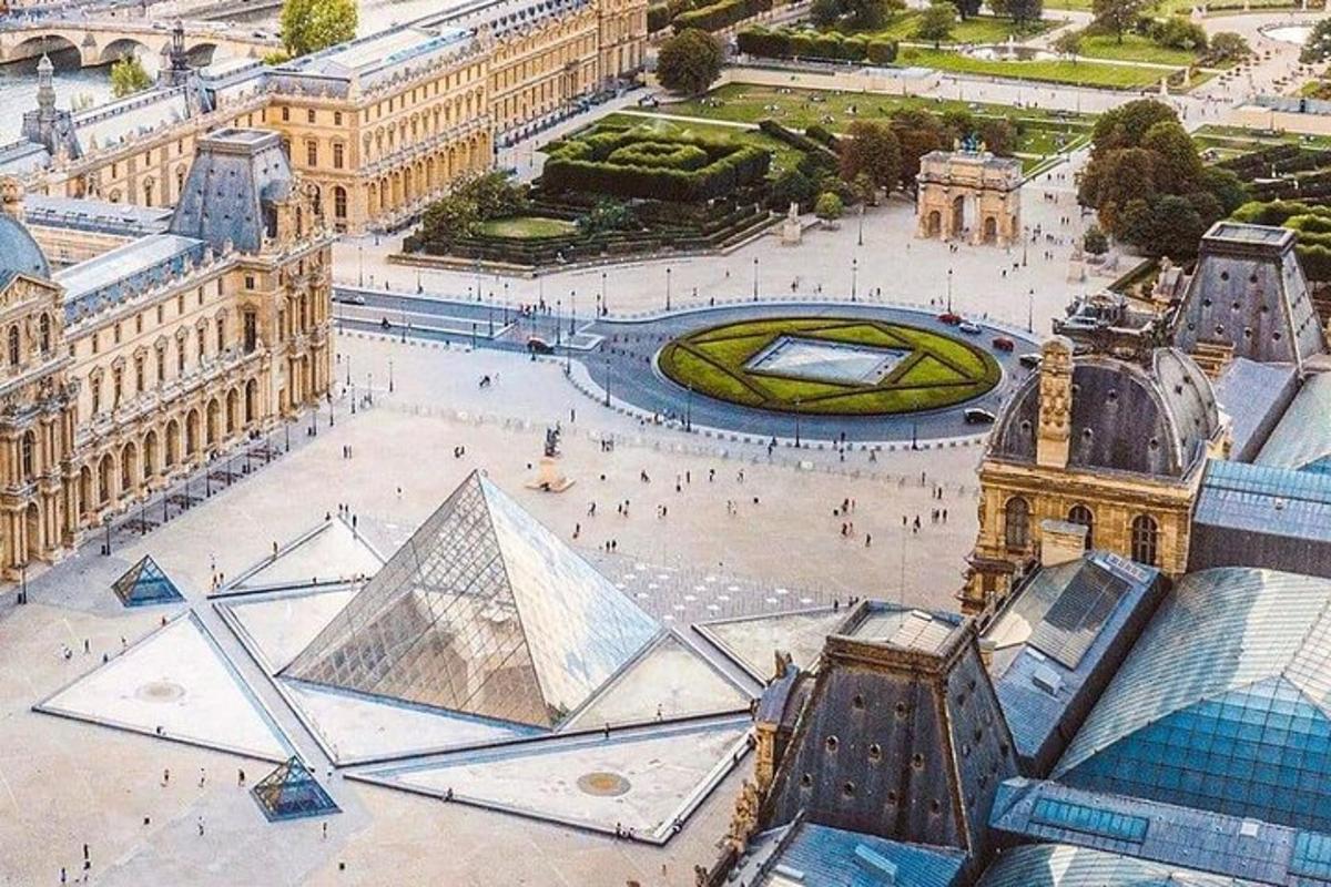 an aerial view of the louvre pyramid and the louvre museum