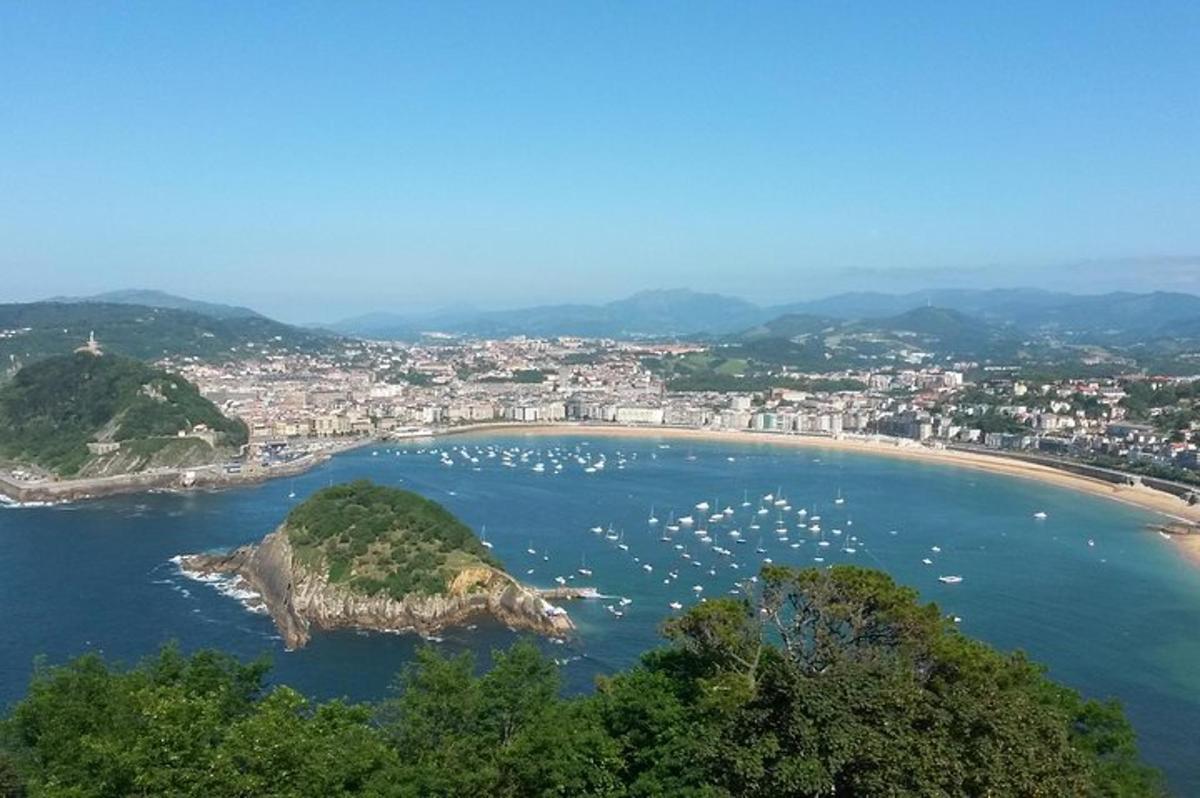 a view of a beach with boats in the water