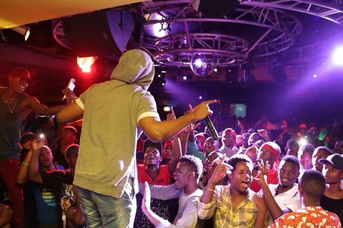 a man standing in front of a crowd of people