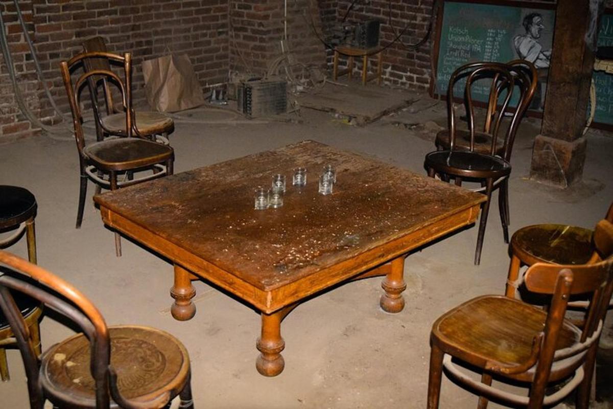 a wooden table and chairs in a room