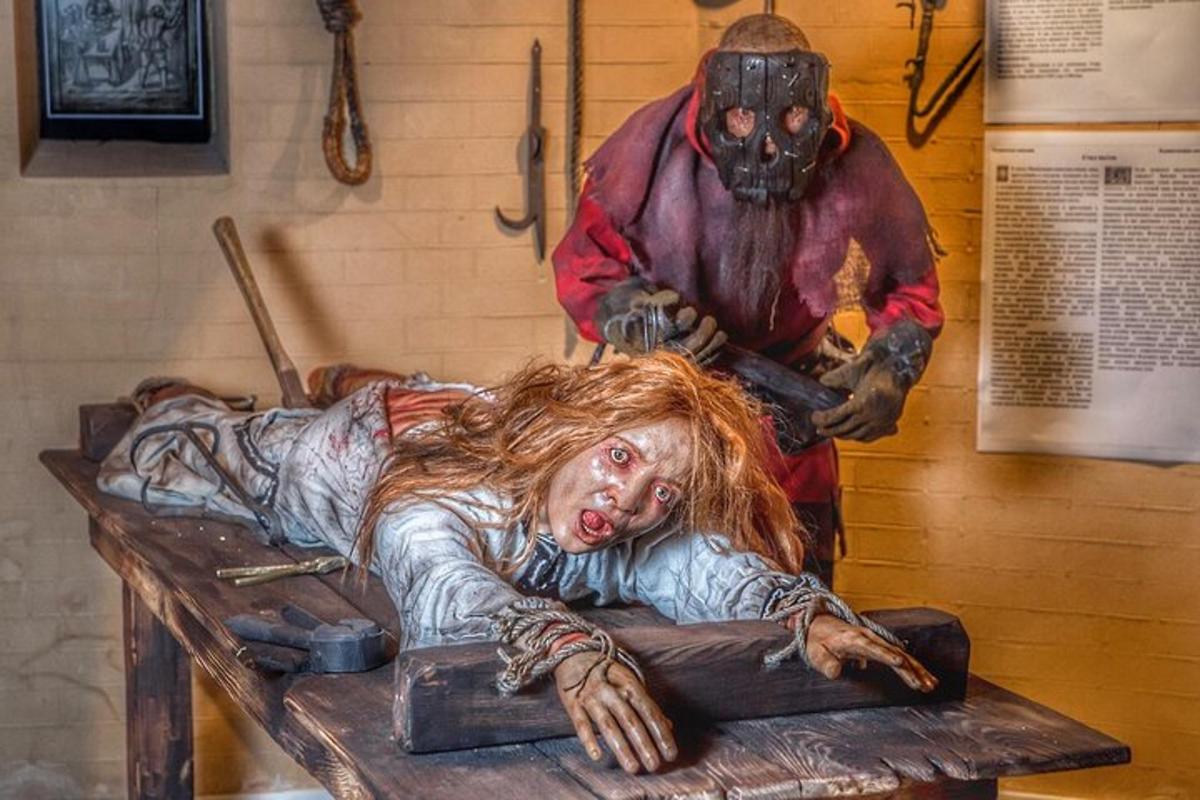 a statue of a person laying on a table
