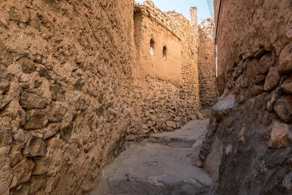 an alley in an old stone building