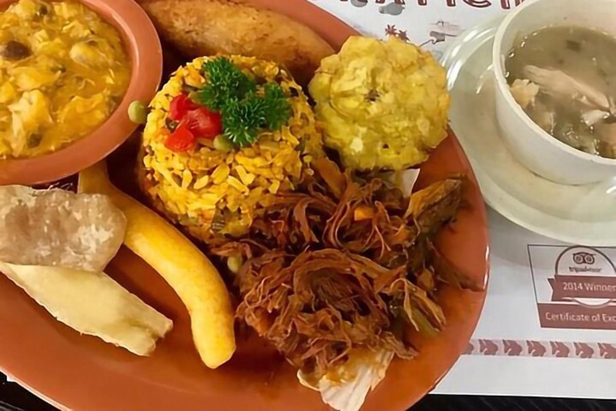 a plate of food with rice and other food items
