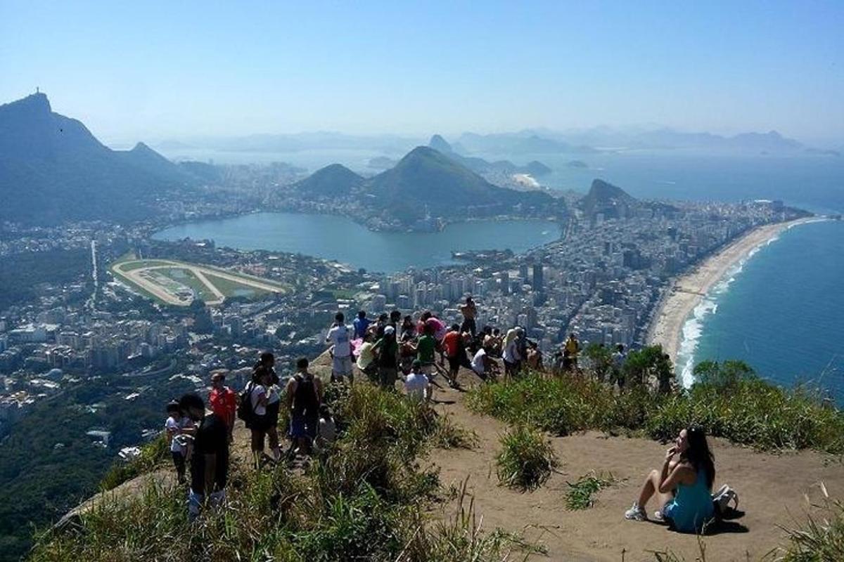 a group of people on top of a mountain