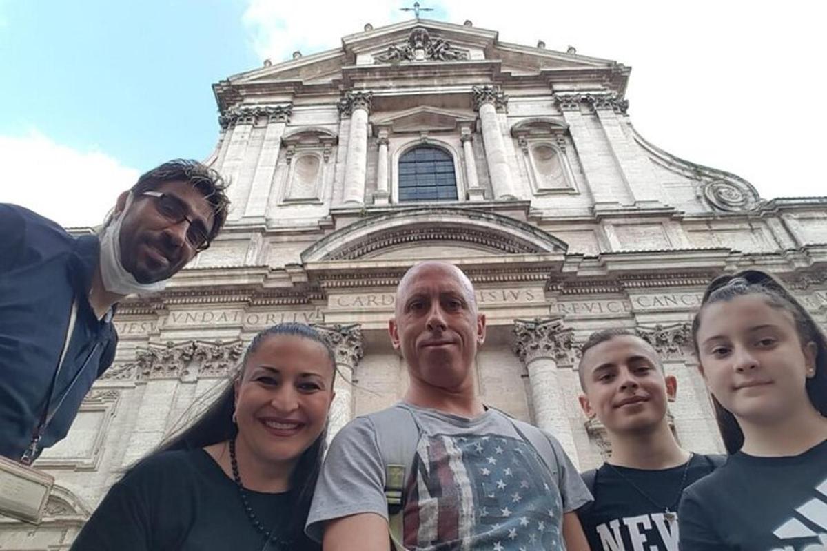 a group of people standing in front of a building