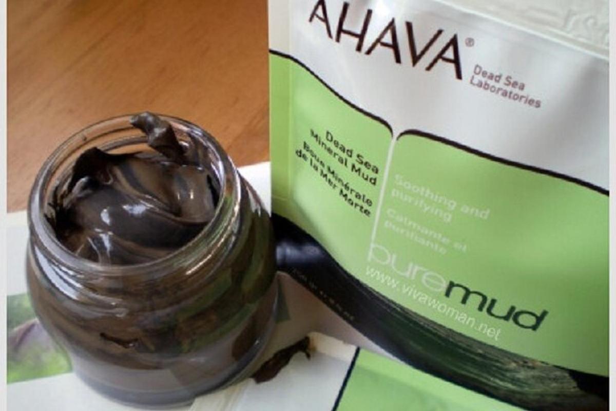 a jar of chocolate pudding next to a box of chocolate