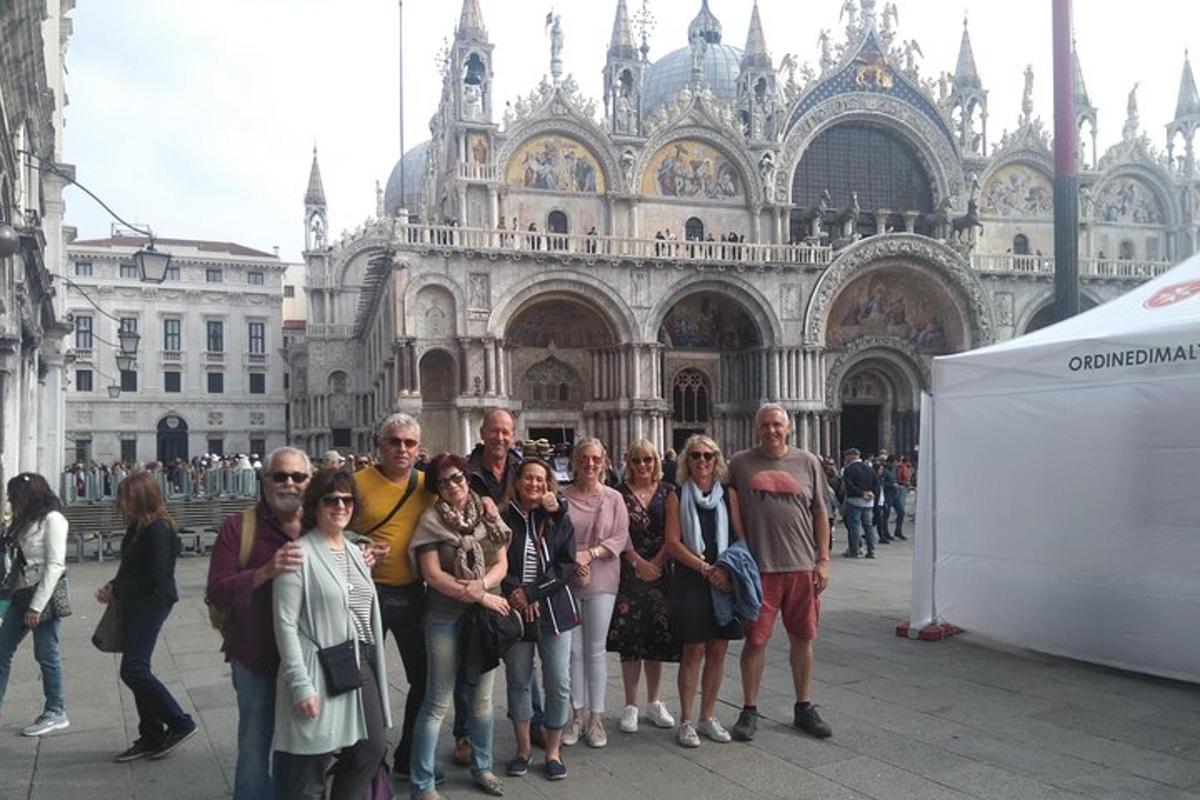 a group of people standing in front of a building