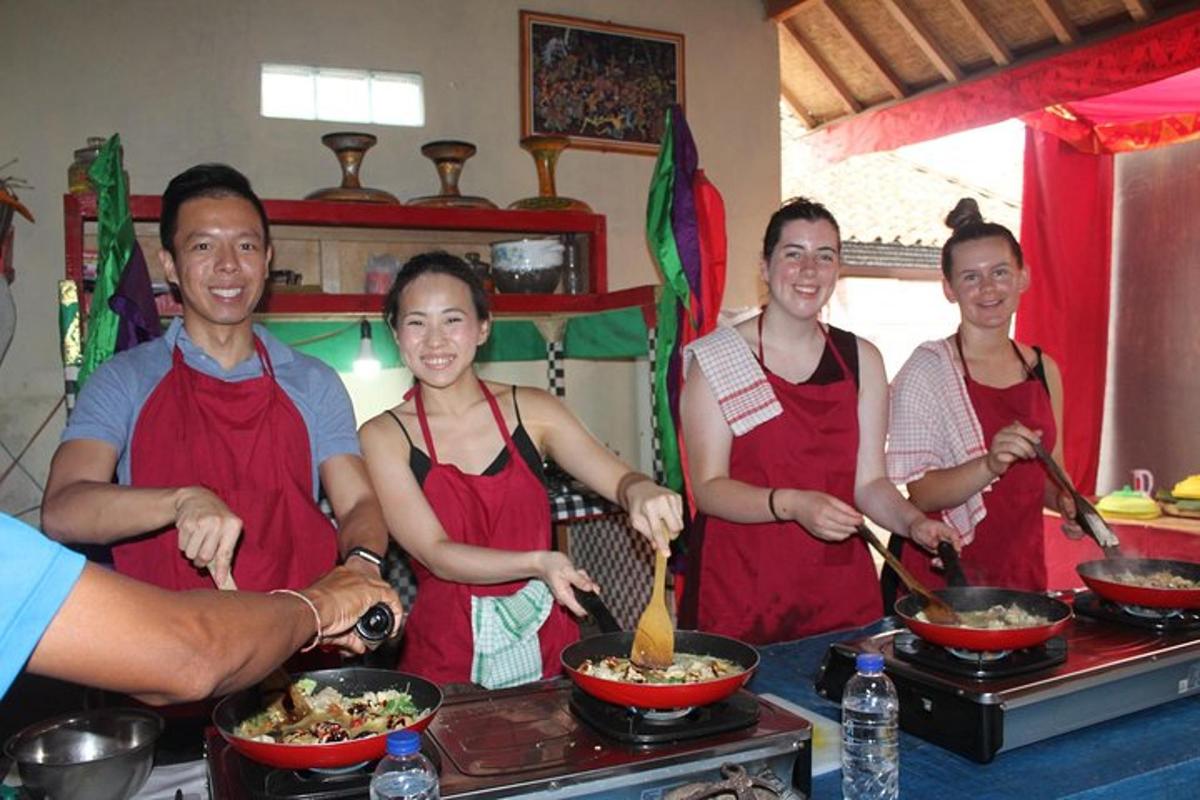 a group of people in a kitchen preparing food