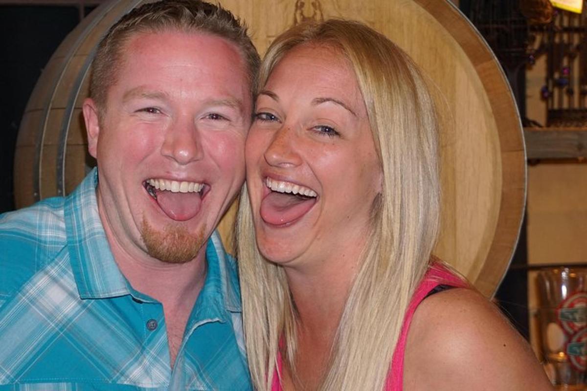 a man and a woman posing for a picture