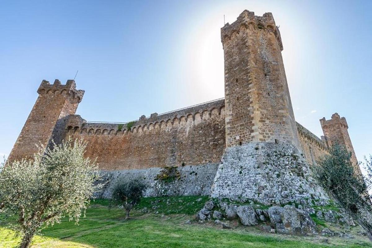 an old castle with two towers on top of it