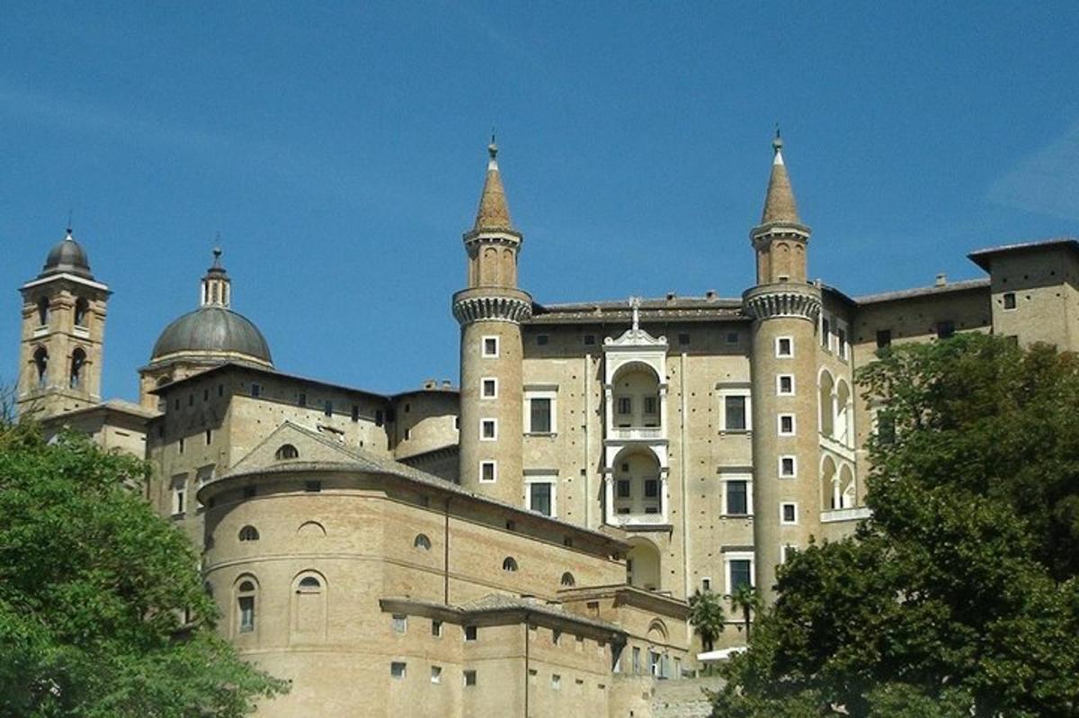 a large castle with two towers on top of it