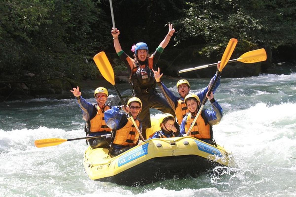 a group of people in a raft on a river